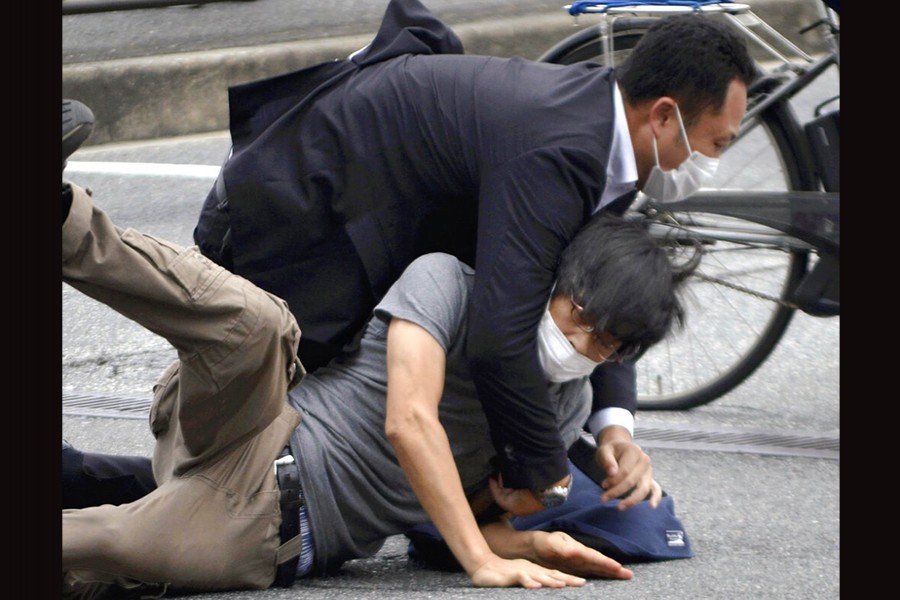 Suspect charged with murder in assassination of Japan's Abe