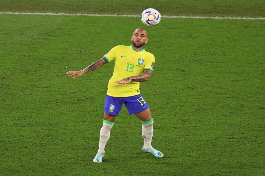 Soccer Football - FIFA World Cup Qatar 2022 - Round of 16 - Brazil v South Korea - Stadium 974, Doha, Qatar - December 5, 2022 Brazil's Dani Alves in action REUTERS/Pedro Nunes