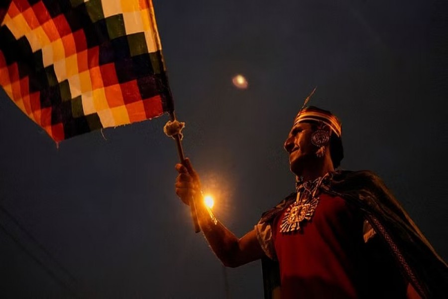 A demonstrator waves a flag amid anti-government protests after Peru's former President Pedro Castillo was ousted, in Lima, Peru January 21, 2023. REUTERS/Angela Ponce TPX IMAGES OF THE DAY