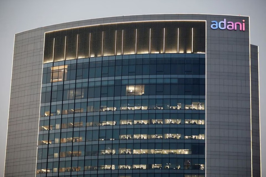 The logo of the Adani Group is seen on the facade of one of its buildings on the outskirts of Ahmedabad, India on April 13, 2021 — Reuters/Files