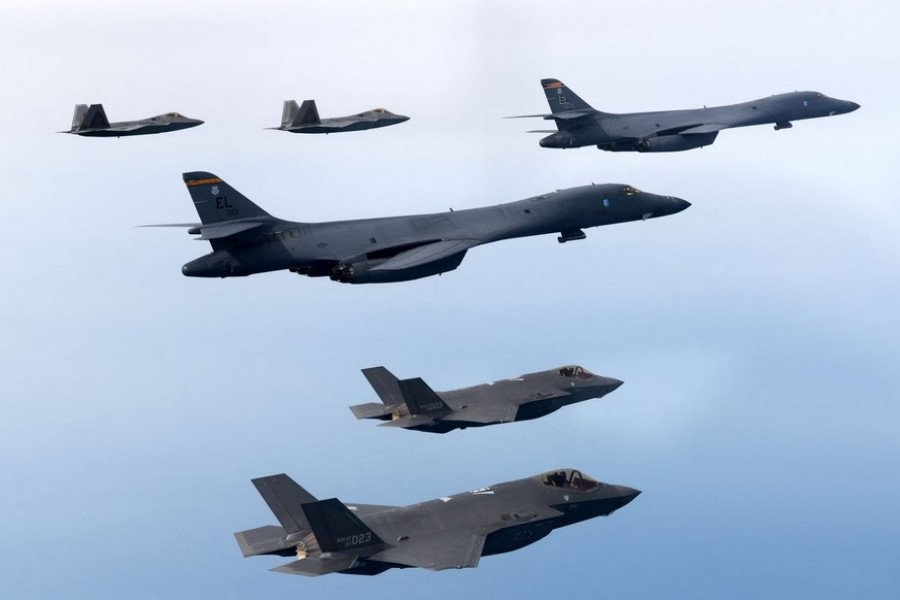 A handout photo dated February 1, 2023 shows South Korean and U.S. Air Forces conducting a combined air training with South Korean F-35A fighters, US B-1B strategic bombers, and F-22 and F-35B fighters participating in the skies over the West Sea, in South Korea. South Korean Defense Ministry/Handout via REUTERS