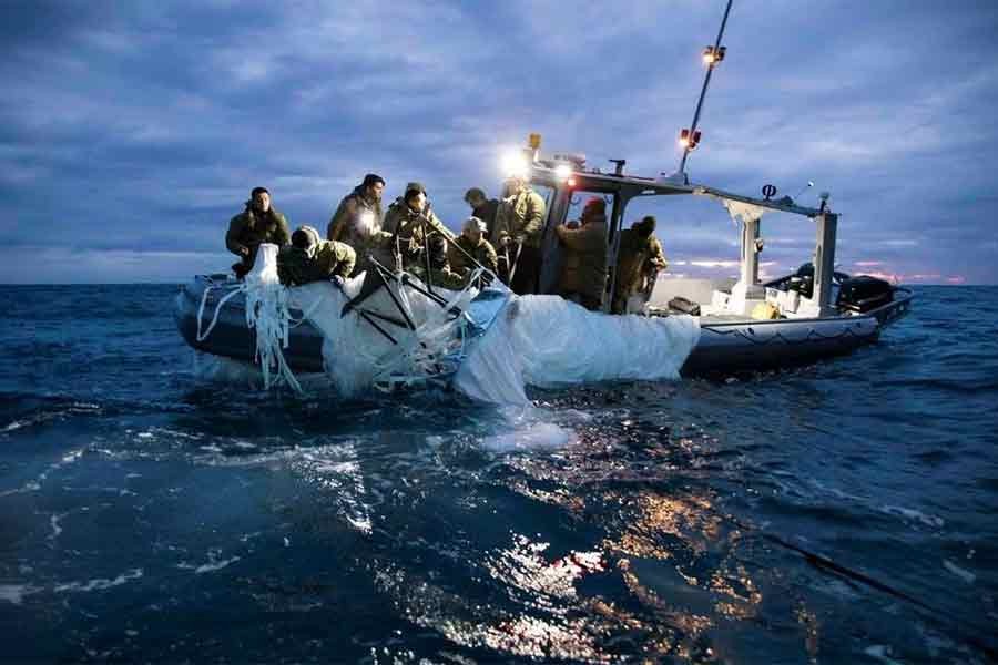 Sailors assigned to Explosive Ordnance Disposal Group 2 recovering a suspected Chinese high-altitude surveillance balloon that was downed by the United States over the weekend over US territorial waters off the coast of Myrtle Beach in South Carolina of US on February 5 this year –Reuters file photo