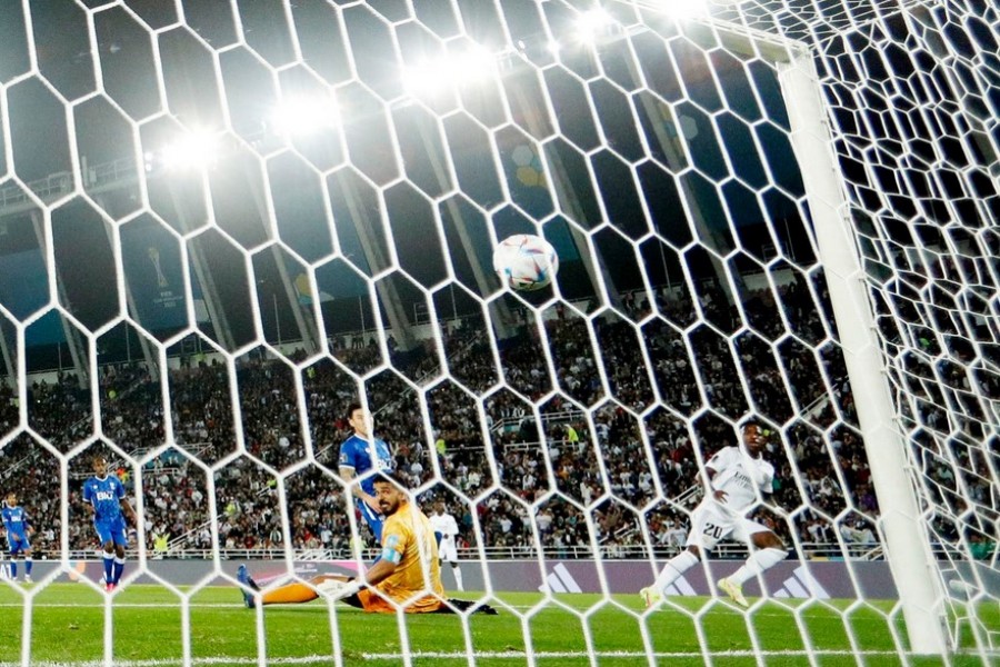 FIFA Club World Cup - Final - Real Madrid v Al Hilal - Prince Moulay Abdellah Stadium, Rabat, Morocco - February 11, 2023 Real Madrid's Vinicius Junior scores their first goal past Al Hilal's Abdullah Al Muaiouf Action Images via Reuters/Andrew Boyers