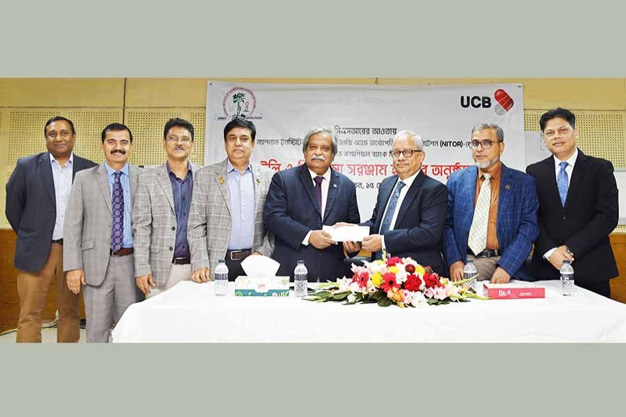 Arif Quadri, managing director and CEO of United Commercial Bank PLC (third from right) hands over various medical equipment to Professor Dr Abdul Gani Molla, director of National Institute of Traumatology and Orthopedic Rehabilitation (fifth from left)