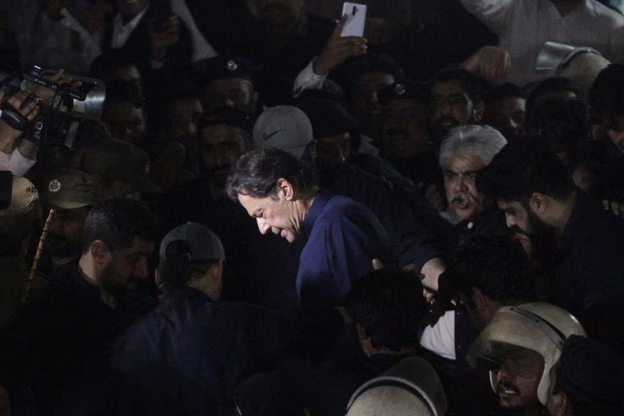 Pakistan's former Prime Minister, Imran Khan, along with his supporters walks as he leaves the district High Court in Lahore, Pakistan on February 20, 2023 — Reuters photo