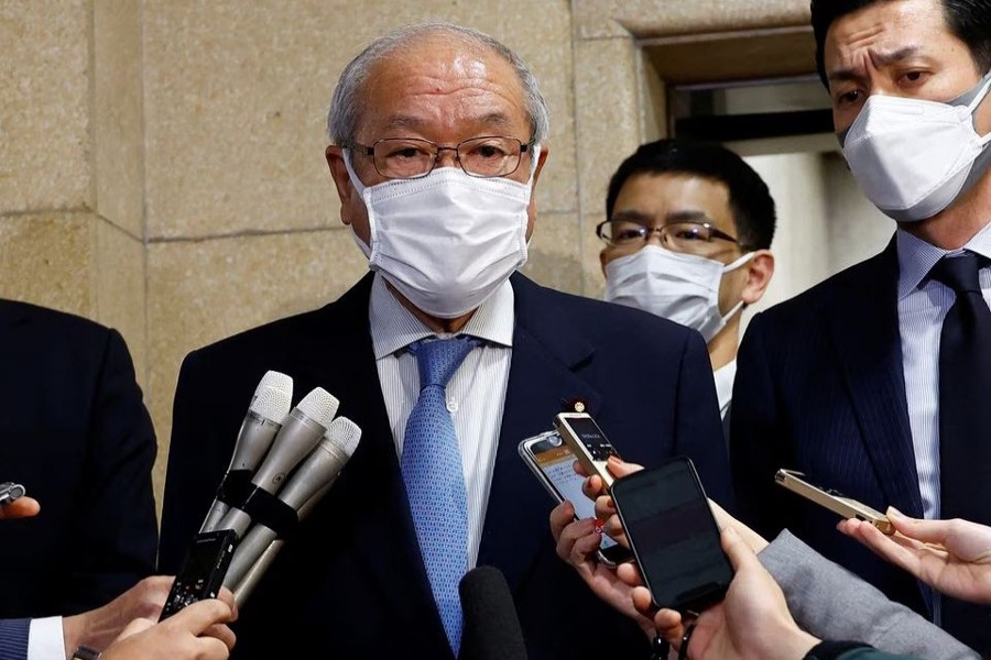 Japan's Finance Minister Shunichi Suzuki speaks to media at Finance Ministry in Tokyo, Japan on December 20, 2022 — Reuters/Files